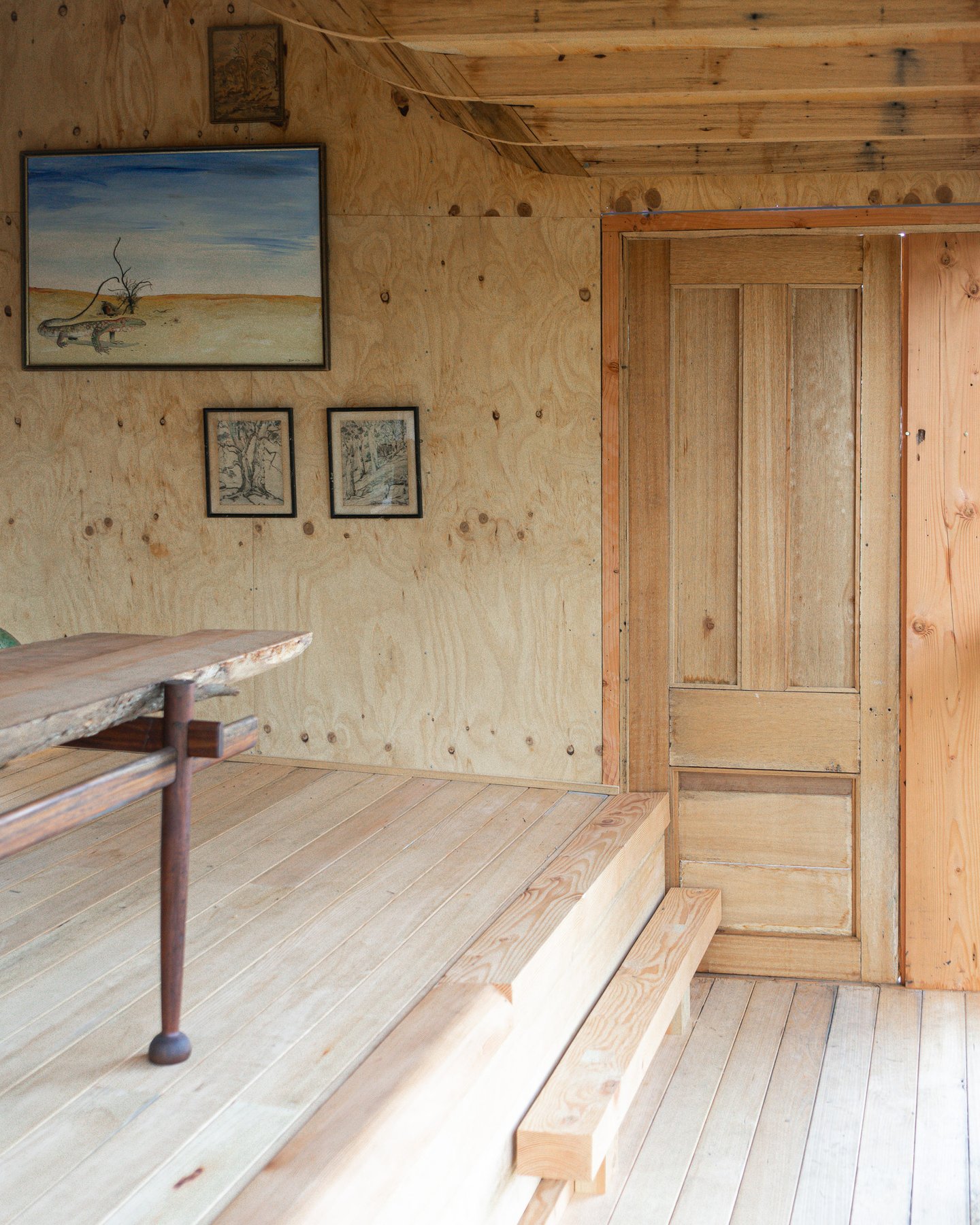 Curved Oregon roof beams and timber interior of the Sarsfield library cabin